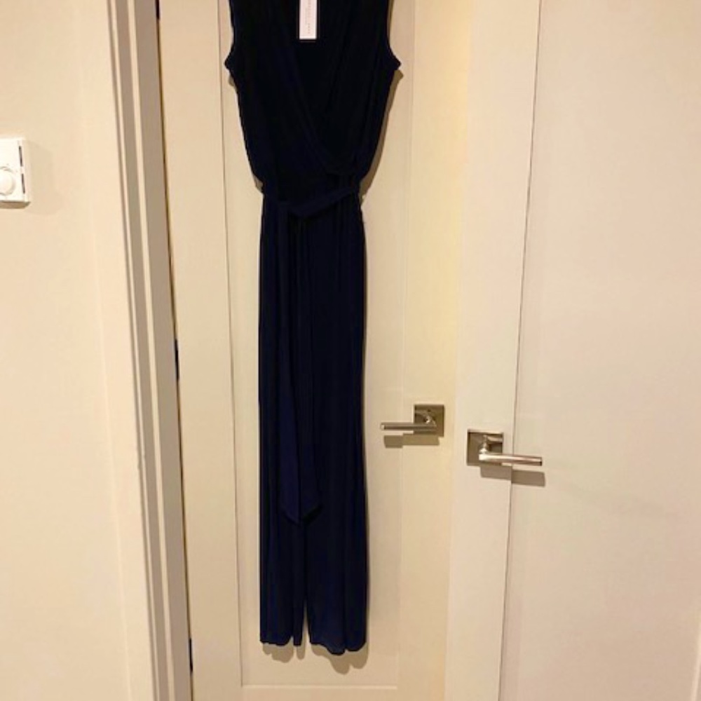 Navy Jumpsuit, V Neck with tie belt.  New with tag